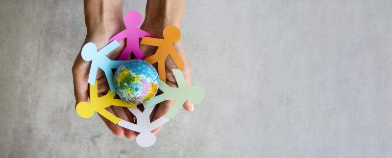 origami-chain-people-with-globe-international.jpg